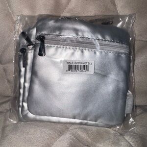 NWT in bag - 
Lug Twinkle pouches (3 piece) in metallic silver